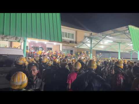 Burmese workers at a factory in Rayong after construction crane collapsed