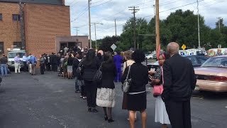 Line of people wait to pay respects to Former Congressman Louis Stokes