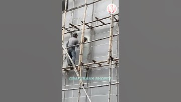 Workers working on exterior wall polishing - good tools and machines improve work efficiency