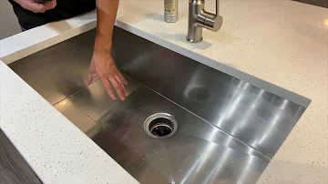 How do I keep my stainless steel sink from scratching?