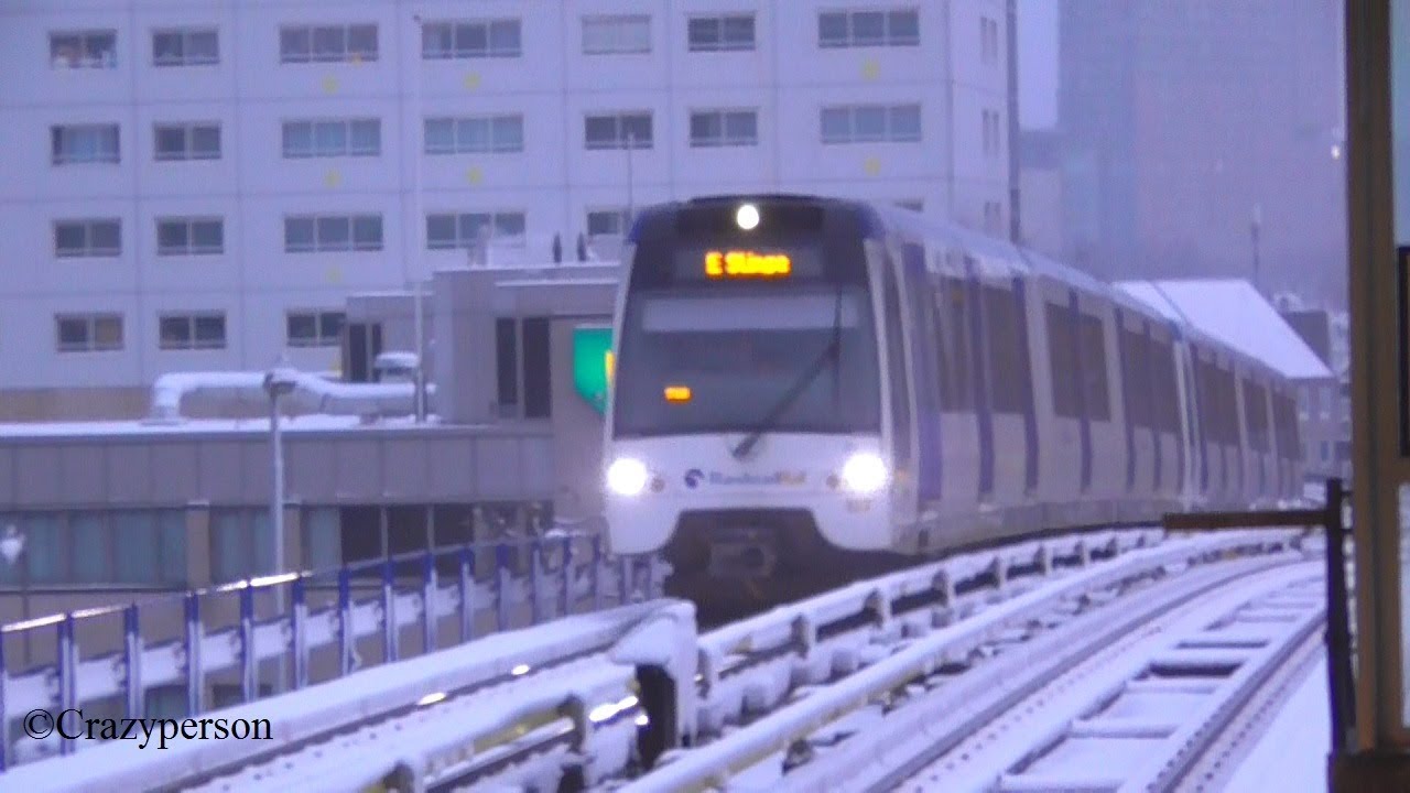 Metros and buses in snow at Zuidplein Rotterdam 2017
