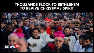 Palestinian Scouts Parade at Manger Square outside the Church in Bethlehem On Christmas Eve | N18G