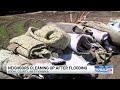 ‘We will make it’: Neighbors cleaning up after flooding