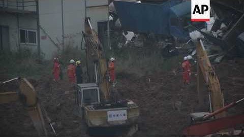 Search for scores of China landslide missing