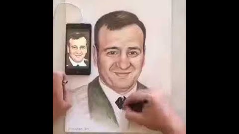 General Polad Həşimov. Telefondakı şəklinə baxıb rəsmini çəkdi. Halal olsun bu rəsmi çəkənə.