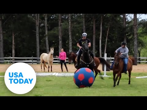 Mississippi police officers 'horse' around in a game of soccer | USA TODAY