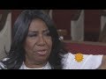 Aretha Franklin revisits church and childhood home in Detroit