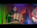 Playing “Vato Perron” with friends at open mic night