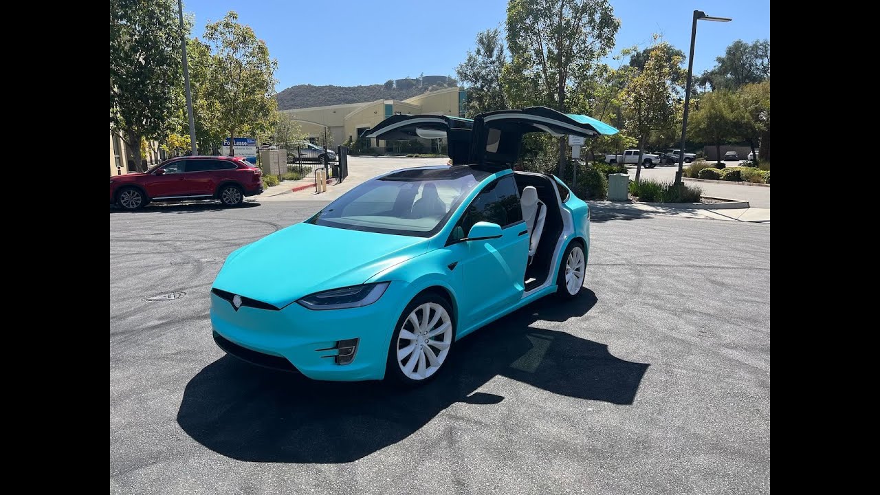 Tesla model X wrapped insatin key west viny by 3m. Beautiful transformation