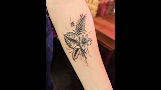 Botanical forearm time lapse female tattoo