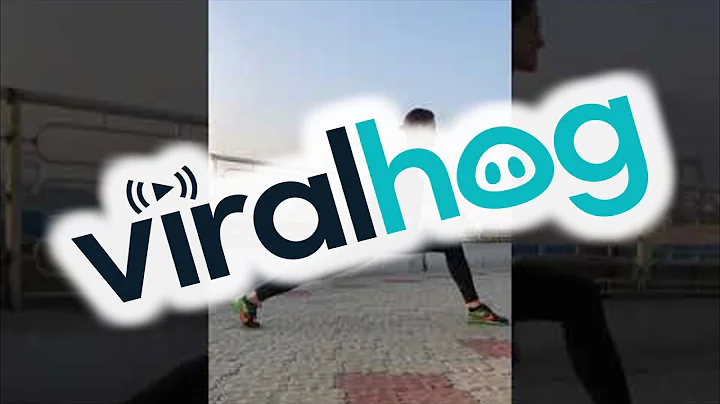 Cute Kitten Climbs on Athlete Doing Stretches || ViralHog