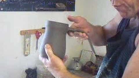 SIMON LEACH - HANDLING A BEER MUG