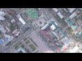 D-Cinelike. Russia, Ulan-Ude. Theater Square named after Lhasaran Linhovoin, Aerial View, HEAD OVER
