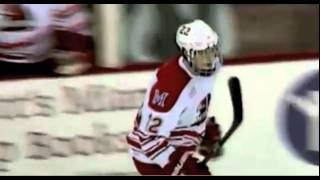 Tyler Biggs scores a backhand goal