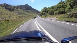 Two F15's Low Pass While Driving to Mach Loop