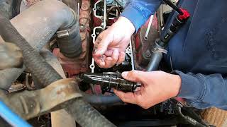 How to change injectors in a Cummins 855 small cam engine.