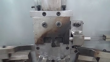Strapping buckle making machine