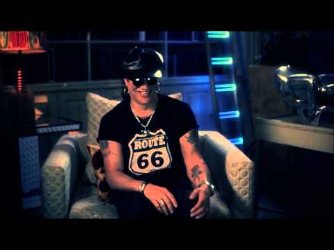 Slash watching YouTube Videos about Axl Rose and his famous Band called Guns N' Roses