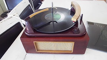 Columbia Voice of Music 3 speed automatic record player playing LP records.