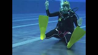 Female Diver is Diving with Body Glove Neoprene Wetsuit and Intespiro Full Face Mask in Pool