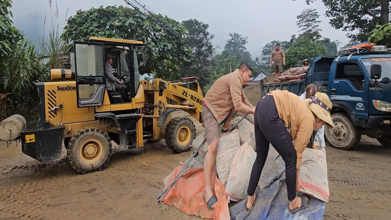The truck carried construction materials for the farmer.