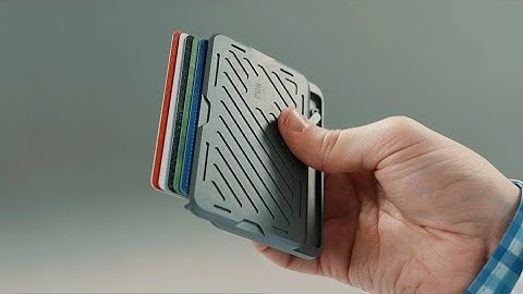 Now on Kickstarter: PunCube Mech Wallet - Push To Reveal & Fidget For Fun