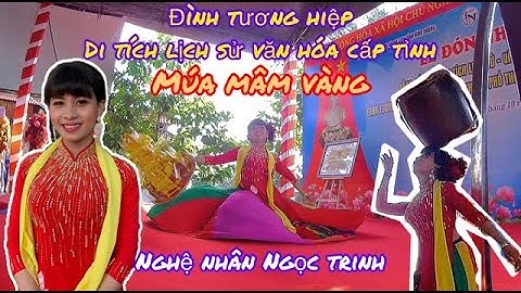 Nghệ nhân Ngọc Trinh biểu diễn múa bóng rỗi tại lễ đón nhận bằng xếp hạng DTLS-VHCT Đình Tương Hiệp