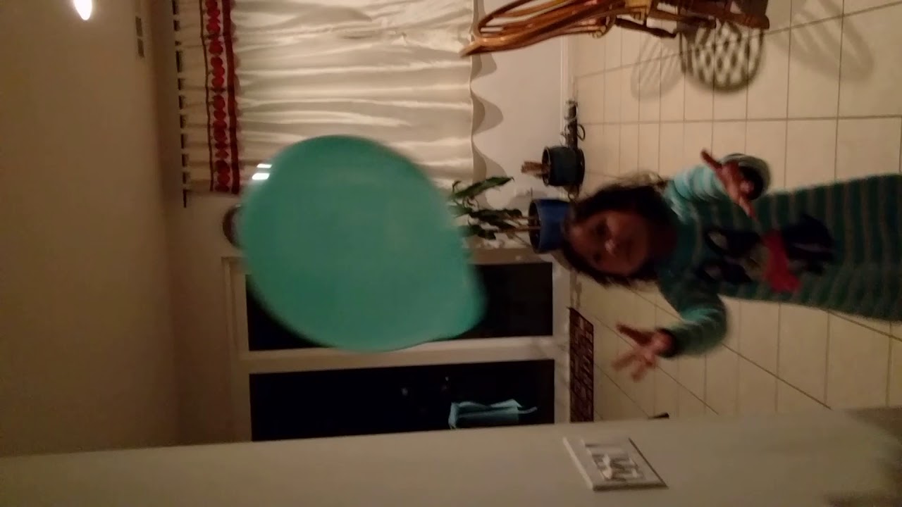 Angelina playing a Balloon