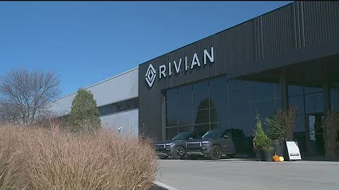 Electric vehicle company Rivian adopts Tesla chargers