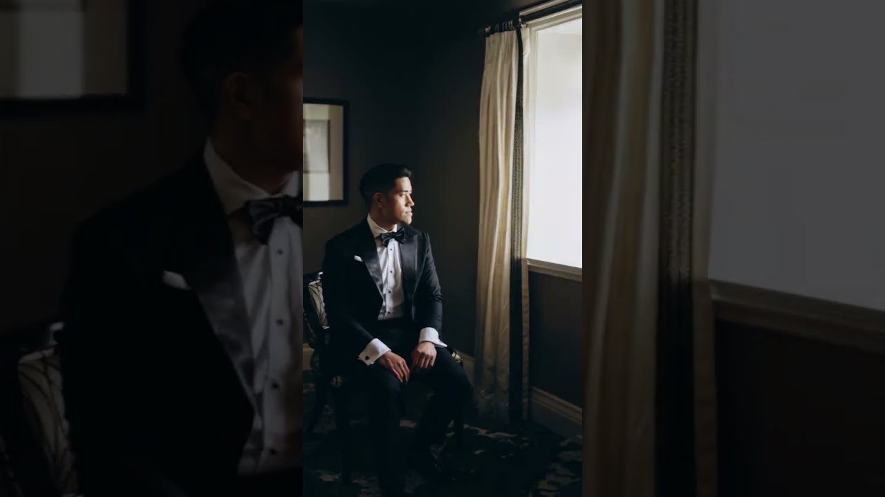 Moody bridal entrance through shadow and light