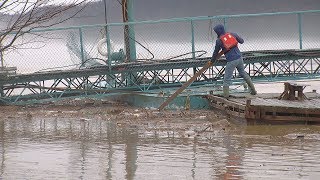 Wary New Richmond residents watch Ohio River rise