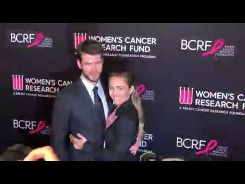 Miley Cyrus and Liam Hemsworth Attend the 