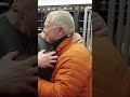 Jim Donovan receives the game ball from Kevin Stefanski and the Cleveland Browns