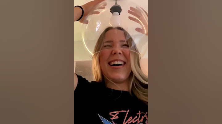 Woman Accidentally Breaks Glass Lamp While Putting Her Face Inside it - 1212017