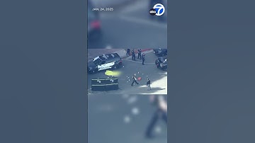Man snatches gun from cop before her partner shoots him