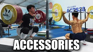 Korean weightlifters working on their accessories