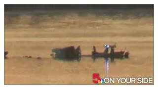 Raw video: American Airlines flight 5342 midair crash scene