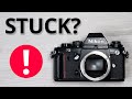 Nikon f3  how to fix stuck film advance  shutter