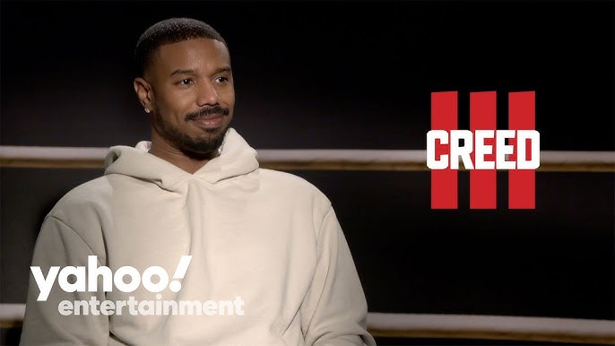 Michael B. Jordan rocks a sharp brown suit while hitting the red carpet for  Creed III