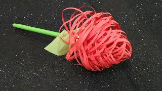 HOW TO MAKE A BEAUTIFUL FLOWER USING COLORED PAPER (كيفية صنع زهرة من الورق الملون)