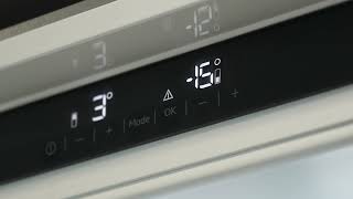 Why is my refrigerator showing an alarm, red warning light, flashing triangle or beeping? | AEG