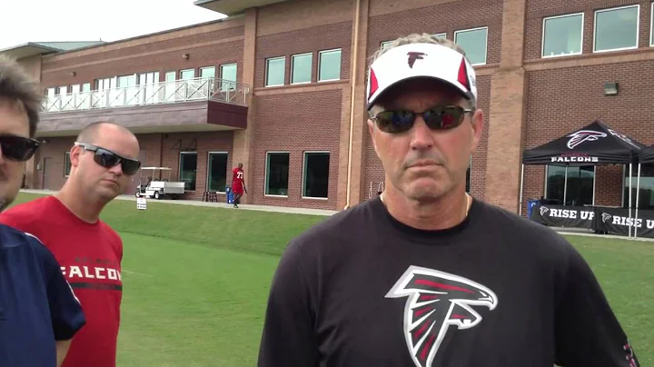 Falcons offensive coach Dirk Koetter talks to the AJC