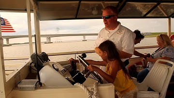 Emily getting instructions how to drive a boat !!!!! Part 1