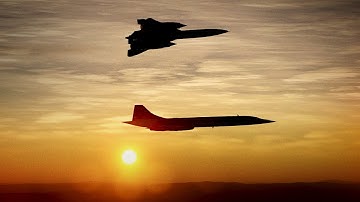 Supersonic pioneers.  A British Airways Concorde is met by an SR-71 Blackbird, date unknown.
