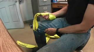 GoHoist.com Using the Marlin Spike Boating Knife.  Remove knots in lifting straps.