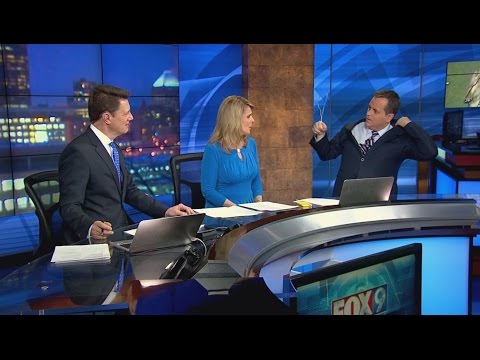 Meteorologist leaves hanger in his suit