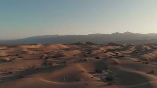 Information Cinematic Aerial Shot of Mojave Desert Sand Dunes at Sunrise | Free Stock Video Update