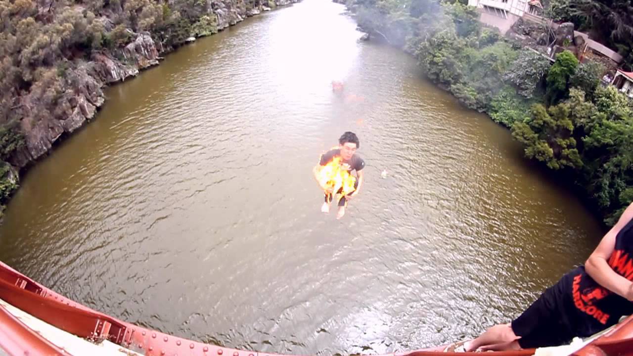 Double Backflip on Fire off bridge!