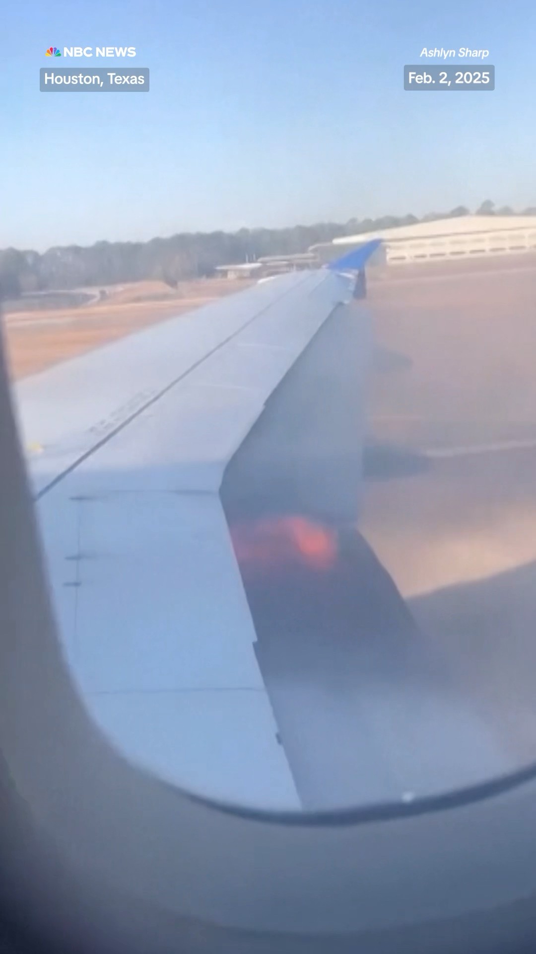 A video shows a United Airlines flight with flames coming from under the wing of the plane.