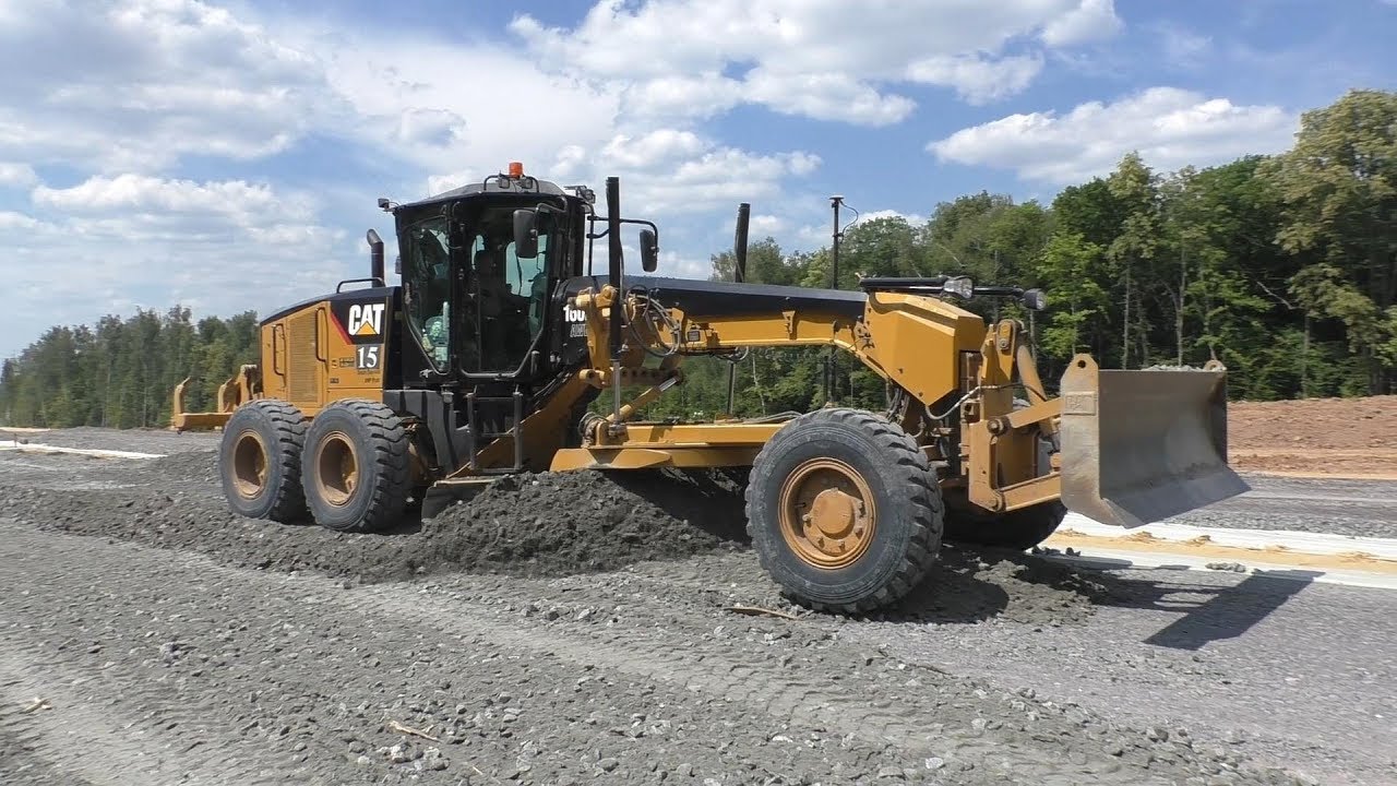 Cat 160M with Topcon 3D GPS spreading gravel part 1